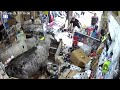 Astonishing moment two cows completely trash store in Colombia