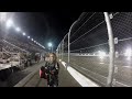 Alex walking along a 200mph flyby NASCAR Daytona 500 (Close up Fence shot)