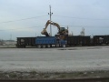 Cat 319DL unloading rock from a train #2