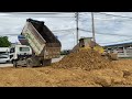 How Boom bulldozer pushing rubbish to open new project Clasinton warehouse Phnom Penh Cambodia