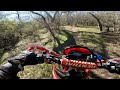 CRF450L. Running over a big snake on the trail.