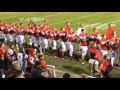 Saginaw Michigan Lutheran Seminary football players sing national anthem before playoff win