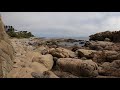 Piedra colgante y pasadizo de roca en Papudo