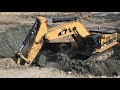 Caterpillar 390D LME Excavator Loading Caterpillar Dumpers On Coal Mines- Operator G. Kyrkos