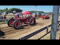 Tandem Farmall H tractors pulling at Rose City Threshing & Heritage Festival