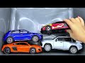 Box full of Model Car Jaguar, Nissan, Audi, Maserati, Peugeot, Volvo, Renault ,Daihatsu, #64 A132