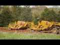 Bell B45E Trucks & K-Tec Scrapers Stripping Topsoil in North Carolina