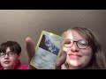 Taihlyn and Kylie unblocking Pokémon cards