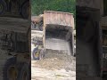 Dumping a Payload of 110 tons Cat 777E Austin Dump body truck#shorts