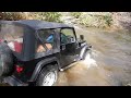 Jeep Wrangler crossing the creek - 4 wheeling Tornado River, SC