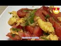 Eggs stir fried tomatoes with garlic and scallions