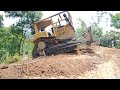 The bulldozer D64 XL suddenly backed up the incline,