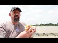 Vietnam's Famous Bánh Mi Sandwich made in a Thai Market And Eaten at The River.