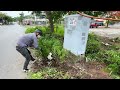 Clean up overgrown grass in public places - Cut grass with rudimentary tools