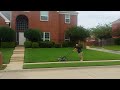 Justin mowing the lawn at the new house