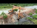 The HYUNDAI 220LC 95 Long Arm Excavator is well suited for roadside construction around a lake