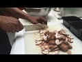 Cutting mushrooms with Shreya