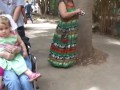 Baby Carlee pushing Gramma in wheelchair at the zoo