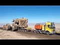 Towing Large Vehicles Cat 797B - Cat 794 AC Truck & Cat 854K Wheel Dozer