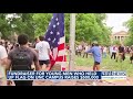 Fundraiser for young men who held up flag on UNC campus raises $500,000