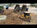 Epic 9 Good Team Working Dump Truck Unloading Stone Soil And Bulldozer Pushing Back Fill In Fence