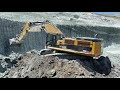 Caterpillar 390D Excavator Loading Trucks For Three Hours - Mega Machines Movie