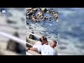 Shocking moment sea lion charges at beachgoers in San Diego