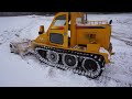 Plowing Deep Snow In a Blizzard With a Bombardier Tank