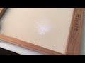 Removing crease or dent on canvas painting