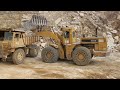 Caterpillar CAT 988B loads CAT 769C