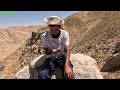 A day with a nomadic shepherd in the mountains and grazing sheep,nomadic lifestyle of Iran,sheepdog