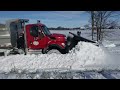 County plow opening drifted shut road in Randolph  County, IN