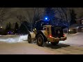 Plowing Residential streets with Loaders after a 47cm snow storm