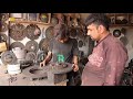 Talented Young Guy Skillfully Repair a Vehicle Clutch Plate