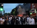 Leeds riot: moment crowd overturns police car