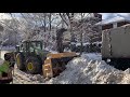 Larue R36 heavy-duty tractor-mounted snow blower loading a truck