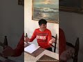 Dad helps his son with his homework