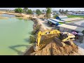 New Project! Resize Road Project by equipment excavator, bulldozer truck spreading soil to Canal