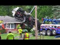 Removing crane from North Greenbush home