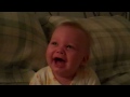 Baby laughs so hard he cries!