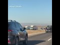 I-15 traffic backup near Baker, California as truck fire burns for 2nd day