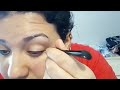 doing my makeup & putting on the eyebrow tattoo stickers