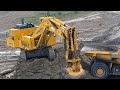 Big Komatsu Mining Backhoe PC2000 Loading on HD785 #alatberat #komatsu #caterpillar #excavator #like