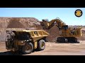 Caterpillar 6060 Face Shovel loading Autonomous Trucks