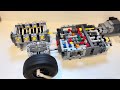Realistic Lego Technic Engine, Gearbox and Wheel Setup Showing the Principles of How. Gearbox Works