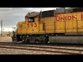 Union Pacific 593 hooks up some empties at the remote siding