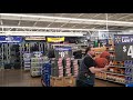 Wal Mart worker juggles basketballs