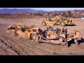 CAT D11T Reverse ripping and push loading 657E 's