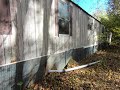 Abandoned Trailer in the Woods