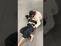 Two jiu jitsu white belts fighting